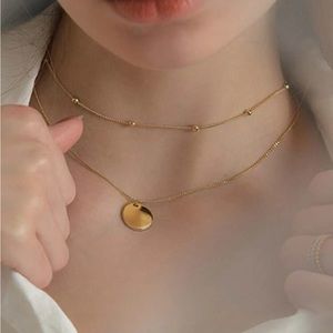 NWT yellow gold color layered disc circle pendant necklace